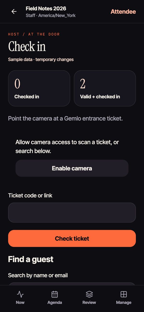 Check-in screen with checked-in count, camera and guest search